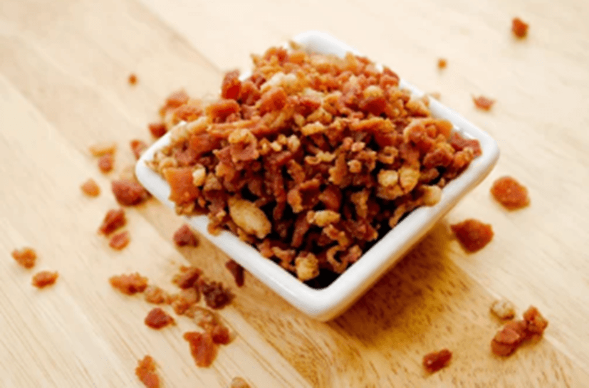 Bacon bits overflowing from a bowl